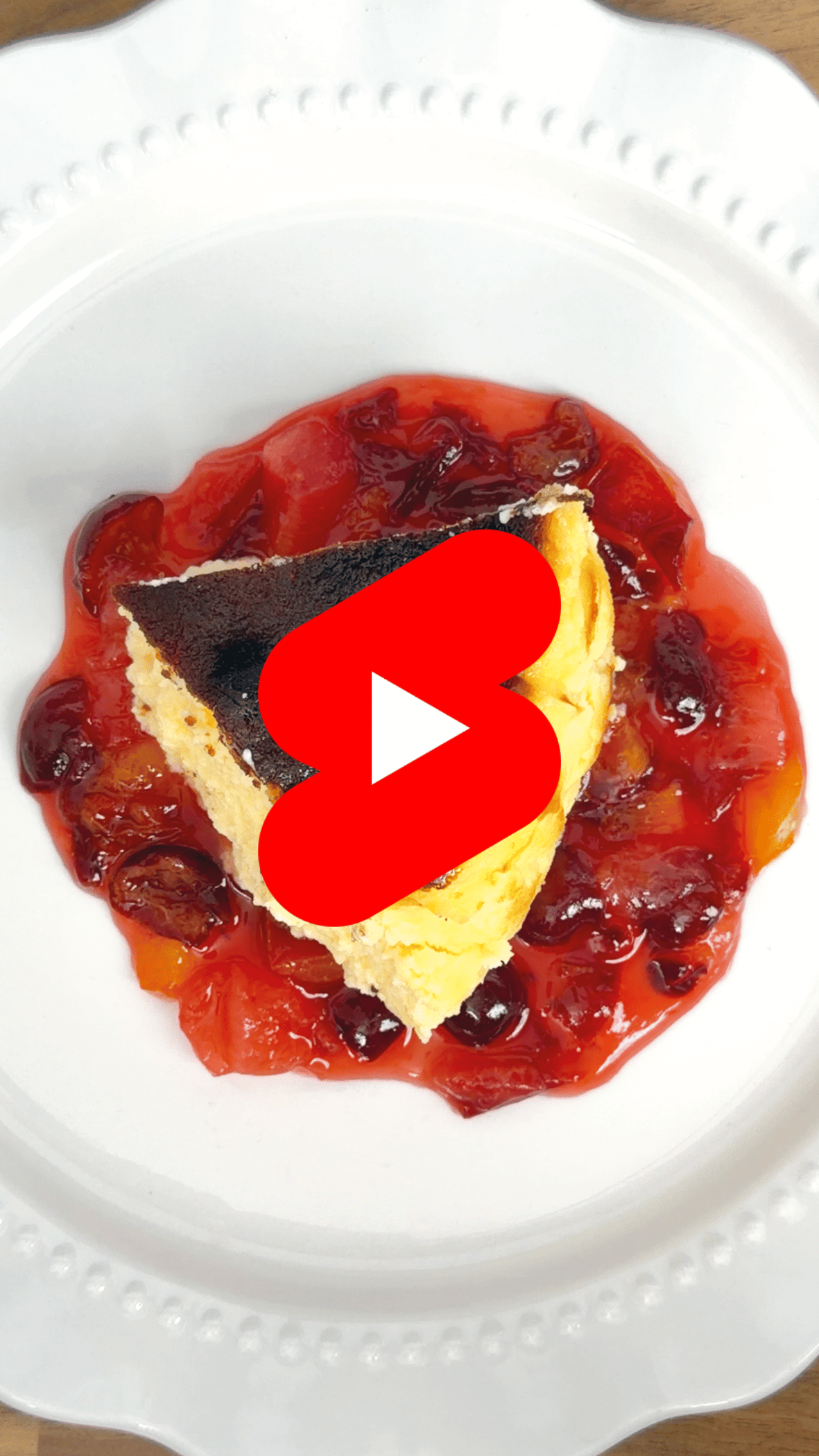 Burnt Basque cheesecake with boozy fruit salad