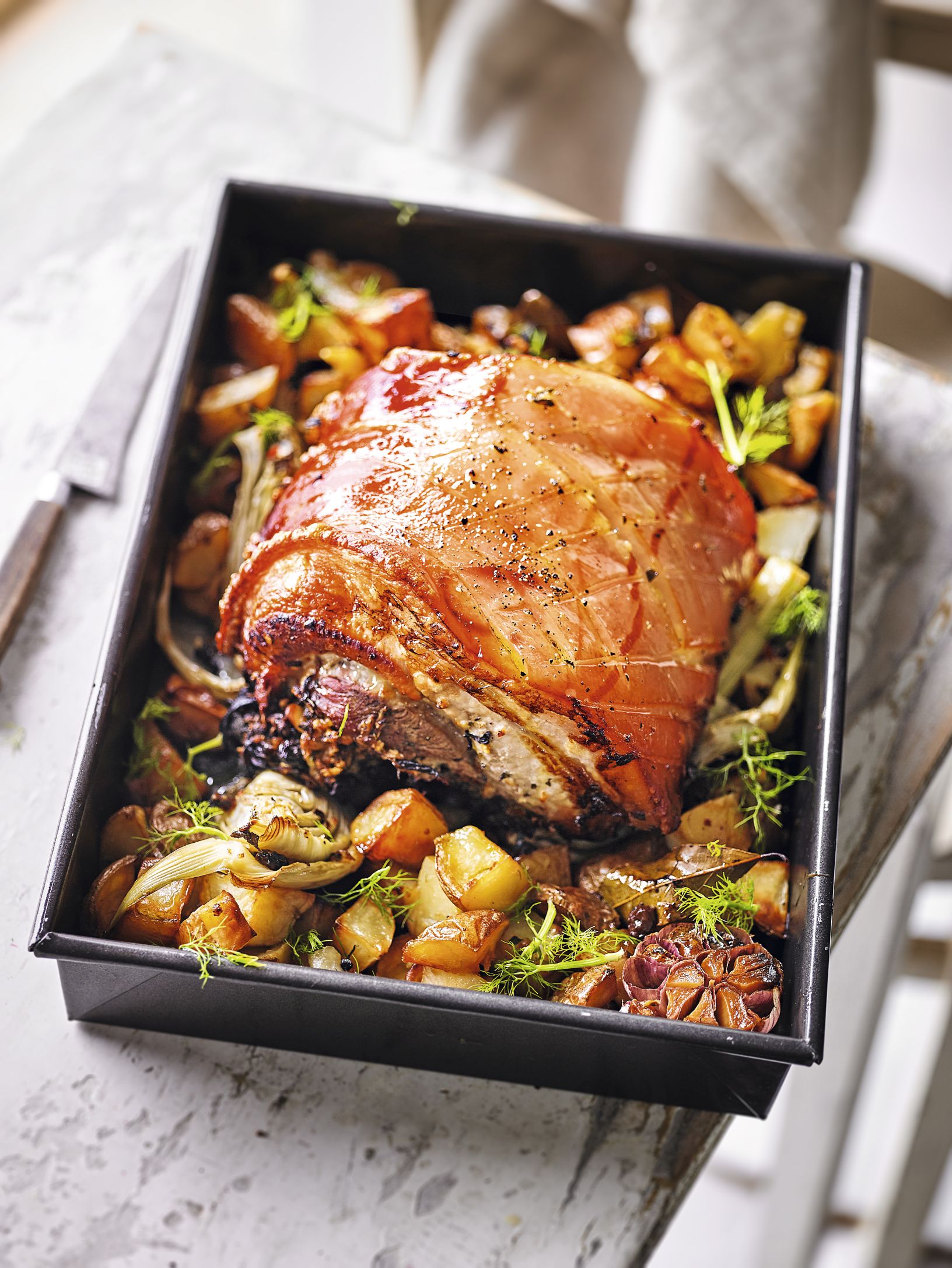 Porchetta-style Pork Belly with Garlic Roasties