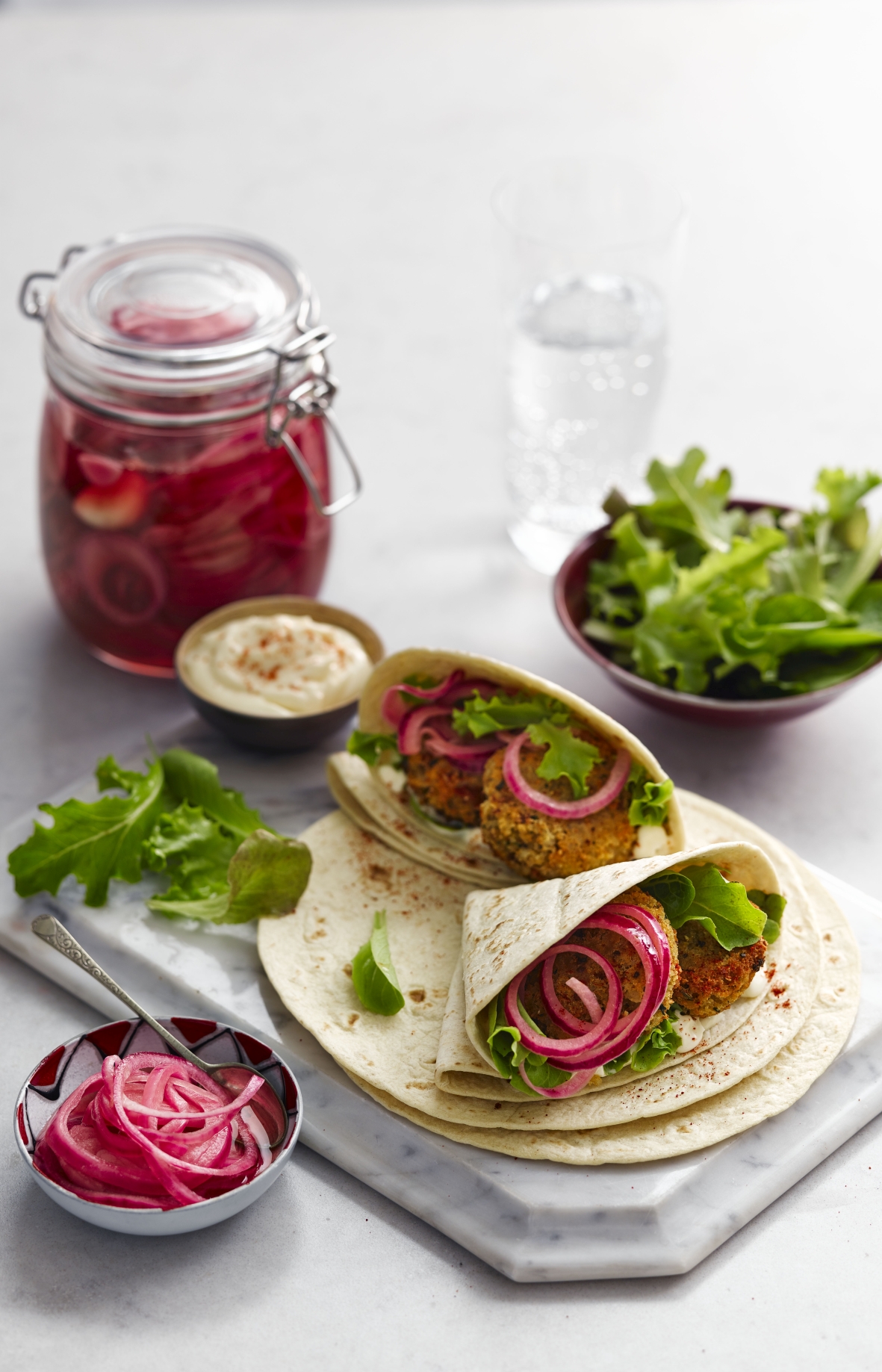 Chilli bean bite wrap with pickled red onion
